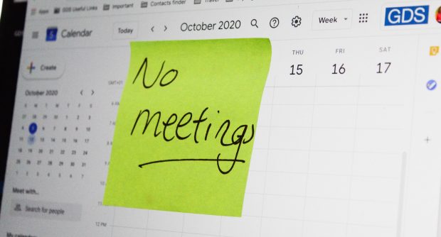 Screen showing October 2020 calendar with a sticky note stuck on the screen, reading “No meetings”.