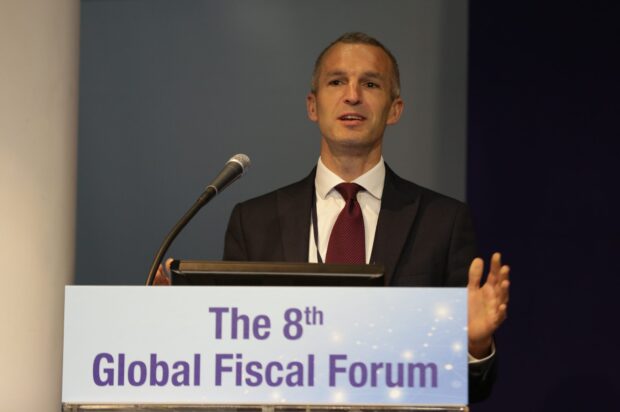 Chris Webber, the head of the Open Innovation Team, speaking at the 8th Global Fiscal Forum in Seoul, Korea.