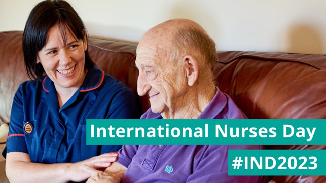 Social care nurse chatting with resident