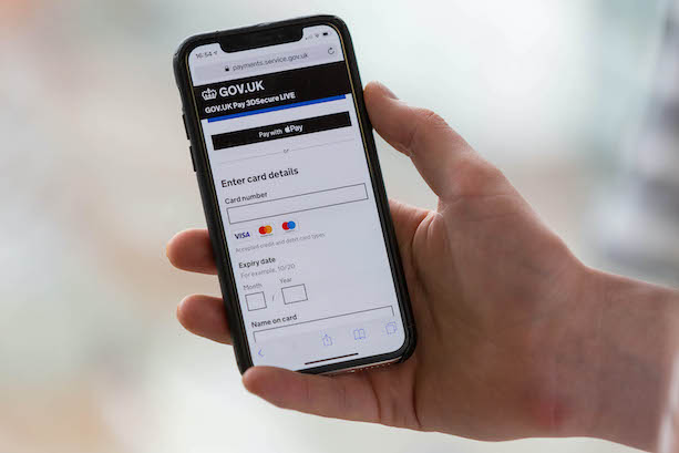 A user accessing GOV.UK Pay on a smartphone