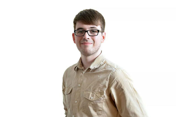 A portrait shot of Aaron Booth