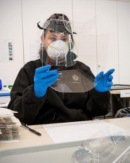 Staff in The Royal Mint assembling the visors