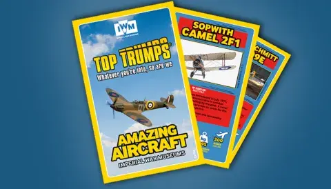 Three amazing aircraft top trumps cards, splayed out on a blue background