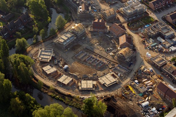Looking down on houses and plots of land