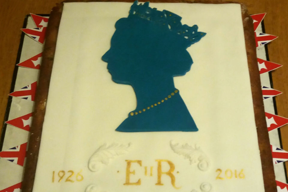 cake with Queen Elizabeth II silhouette in icing
