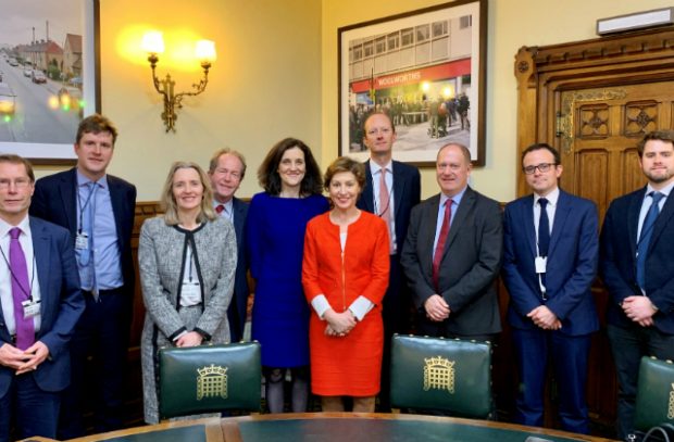 Environment Secretary Theresa Villiers and Minister Rebecca Pow (centre) pose with representatives from a number of stakeholder groups.