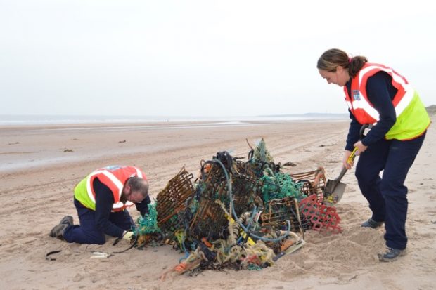 IFCA helping out on the beach