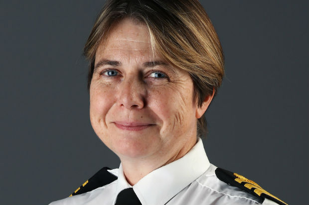 Head and shoulders photo of Royal Navy Commander Kay Hallsworth, who lives with the condition ME
