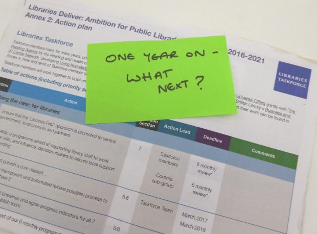 printed action plan with postit note saying: one year on - what next?