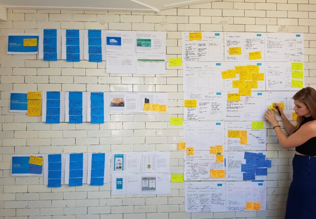 User research displayed on a wall