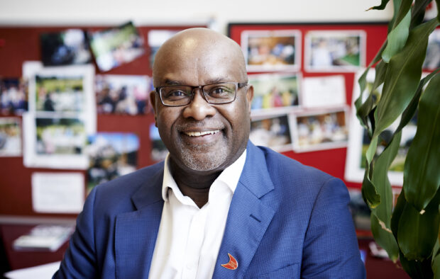 John James, chief executive of Sickle Cell Society, smiling at the camera