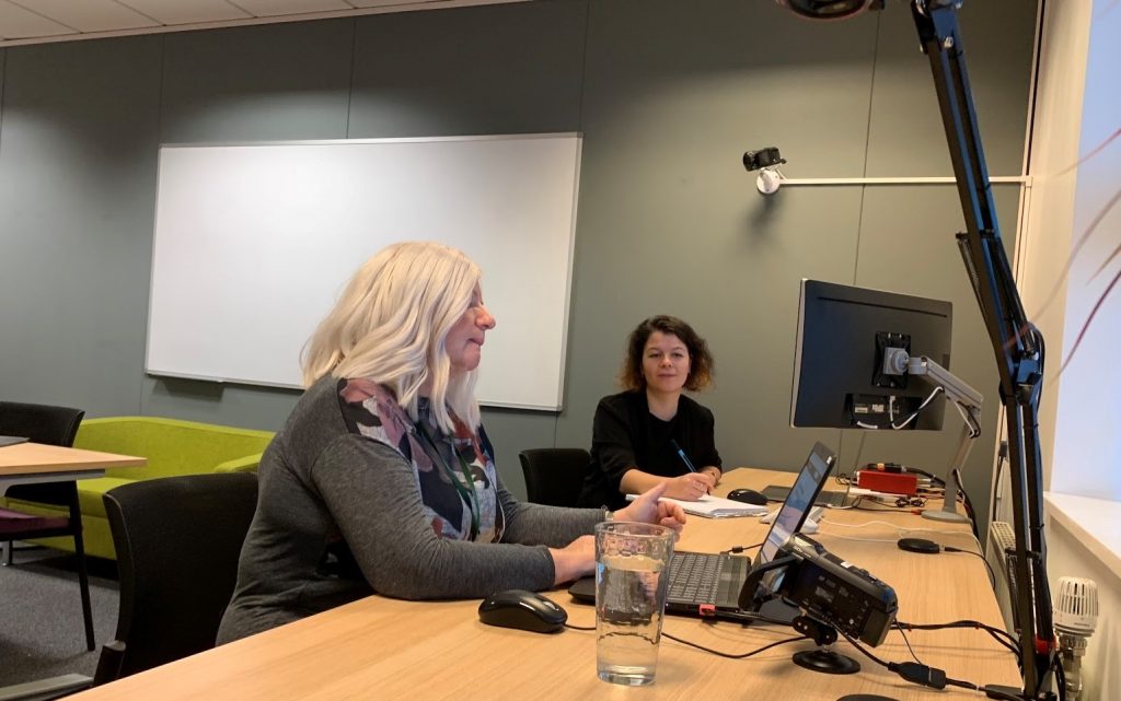 A female user tests a service with a female user researcher in the lab