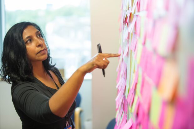 A person participating in a workshop about public services.