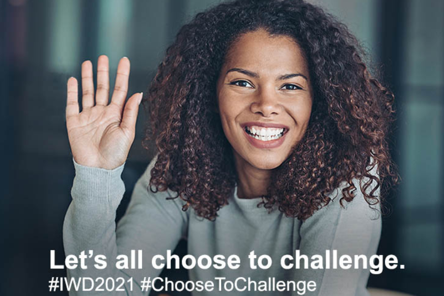 Woman smiling an celebrating International Women's day