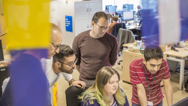 GOV.UK team looking at project work