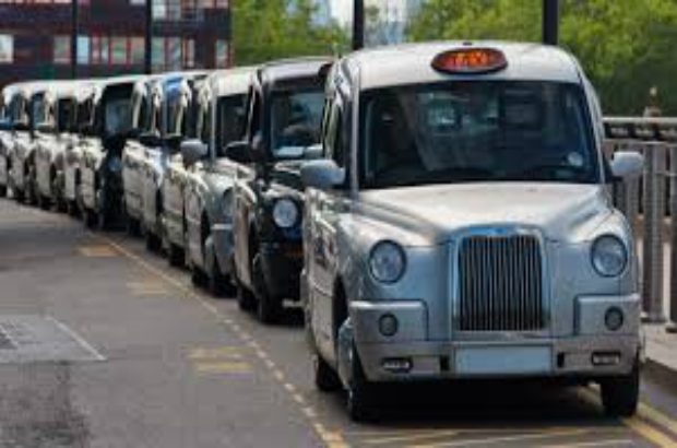 Image of a row of Taxi Cabs