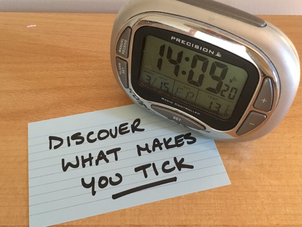 Digital clock beside the words Discover What Makes You Tick