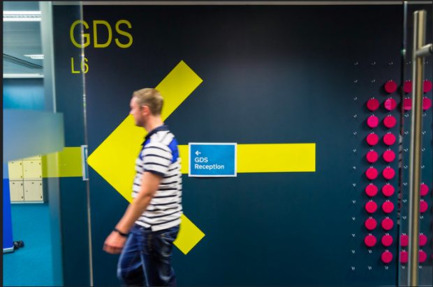 GDS colleague walking through office