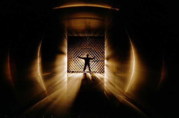 A picture of a wind tunnel worker testing air flow
