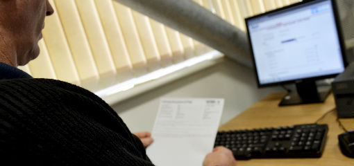 Tester looking at brake imbalance calculation information