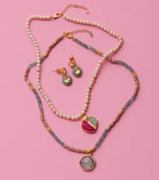 Shine bright with pops of joyful colour Necklaces and earrings with bright gemstones and enamel, designed by Azga and Carousel jewels