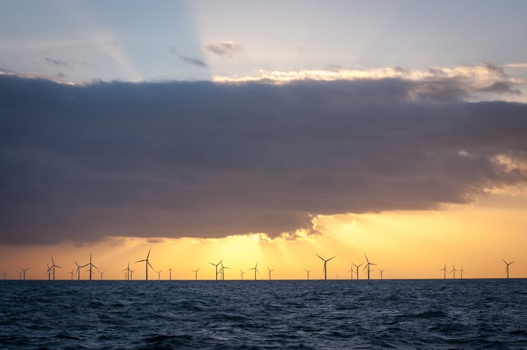Wind turbines in front of sunset