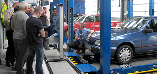 vehicle on test ramp, being demonstrated to trainees