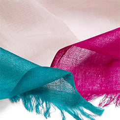 Kashmir Loom - merino wool scarves A close up of three colourful scarves.