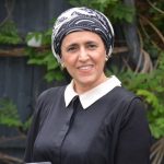 A person smiling for the camera
