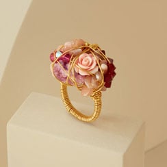 Black & Sigi jewellery Statement ring with pink stones wrapped in gold wire.