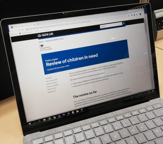 Photo of a laptop with the review of children in need displayed on the screen
