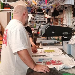 Imprint Works fashion designers Imprint Works screenprinting t-shirts in their London studio.