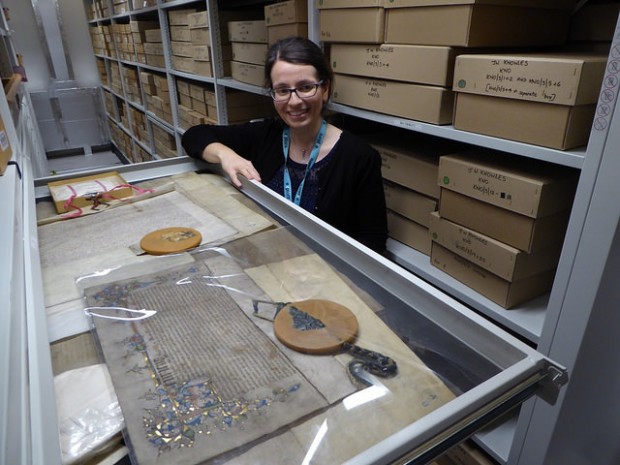 Victoria Hoyle - city archivist, showing us one of the beautiful old civic charters in the new archive