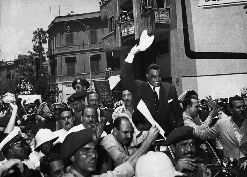 Egyptian president Gamal Abdel Nasser returns to cheering crowds in Cairo after announcing the nationalization of the Suez Canal Company, August 1956 (Public Domain)