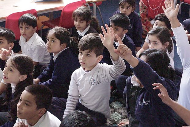 a classroom of children engaging in a lesson