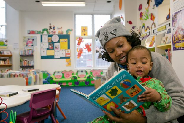 Shared reading in a library. Photo credit: Society of Chief Librarians