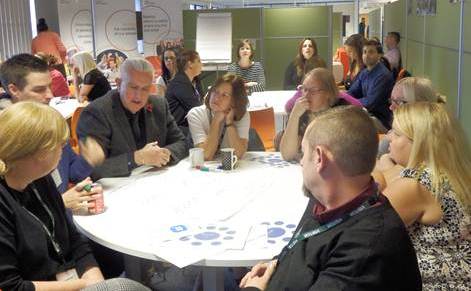 Colleagues discussing success