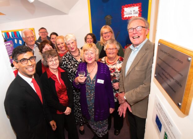 A group of people at the opening of the new extension