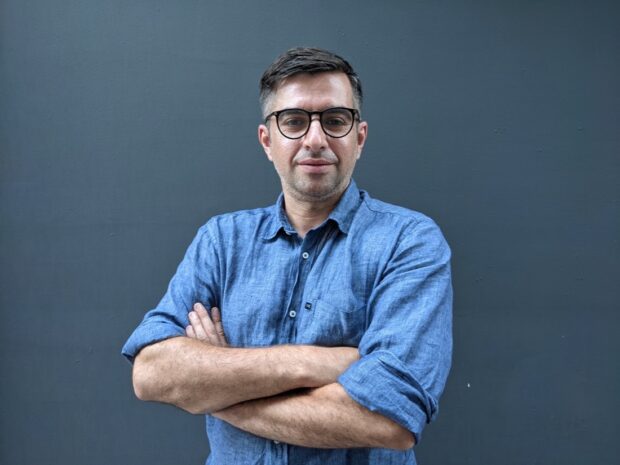 A headshot of Alex Giamas