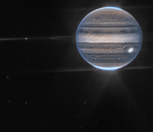 An infrared image of Jupiter as photographed by the James Webb Space Telescope.