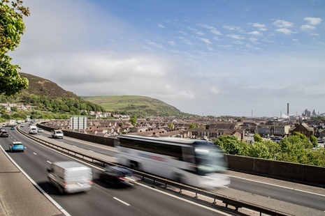 Cars travelling at speed on a road