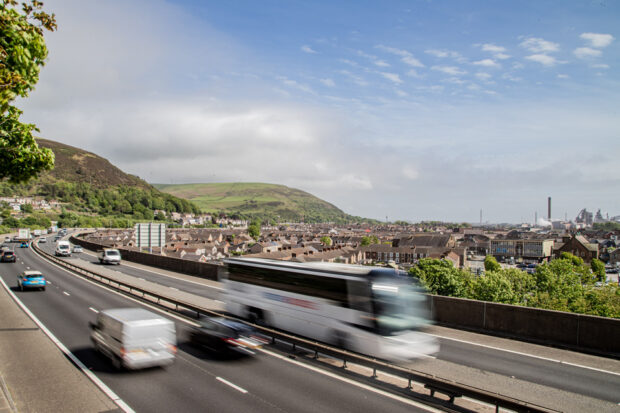 Dual carriageway with cars and buses on