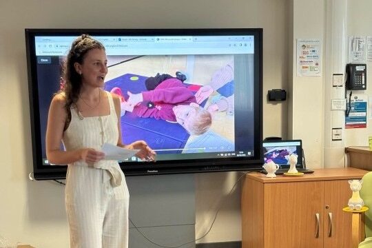 An image of Katie presenting Moti Me