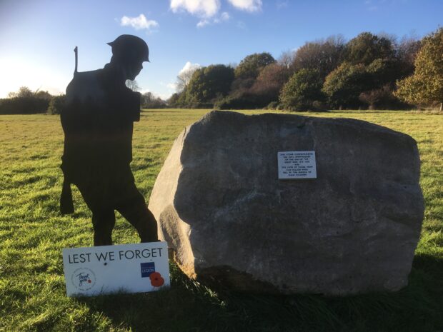 the sarsen stone and plaque commemorating those who died in WW1