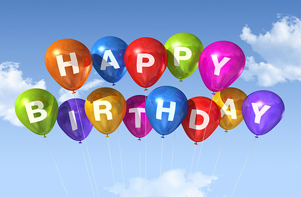 Image of Happy Birthday text within balloons floating in the sky.