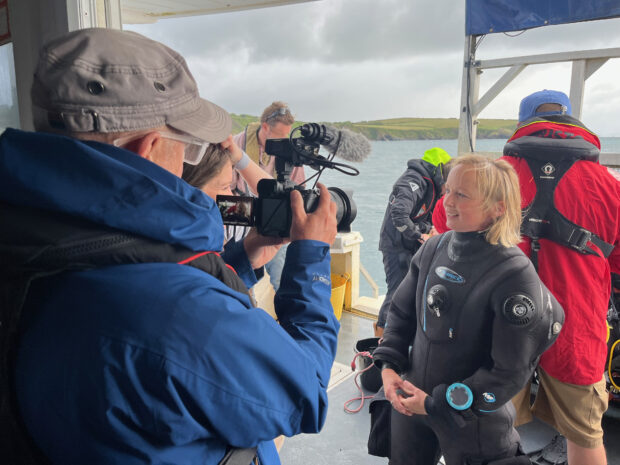 Filming interviews on the boat with the BBC. Credit: Francis Bunker