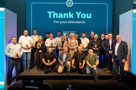 Knowingly Safe 24/7 Awards 2026 winners pictured with the event host James Lewis, head of EHSSQ for major projects at Sellafield (pictured back row centre).
