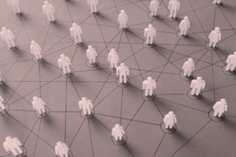 Illustration of connected figures representing members of an advisory committee network.