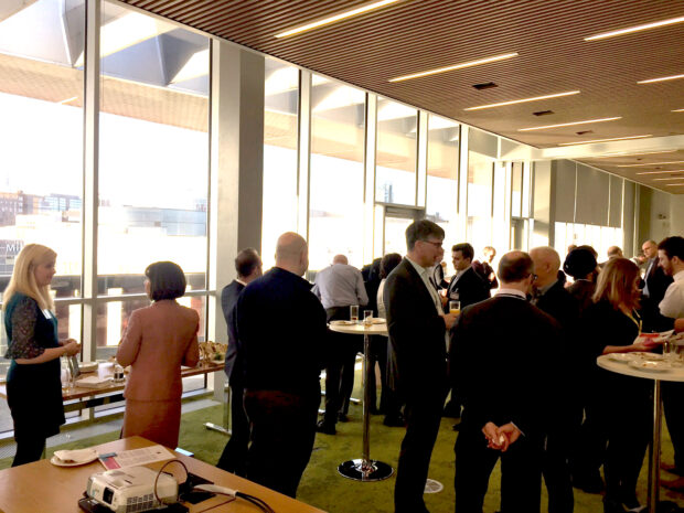 People networking at the stakeholders lunch
