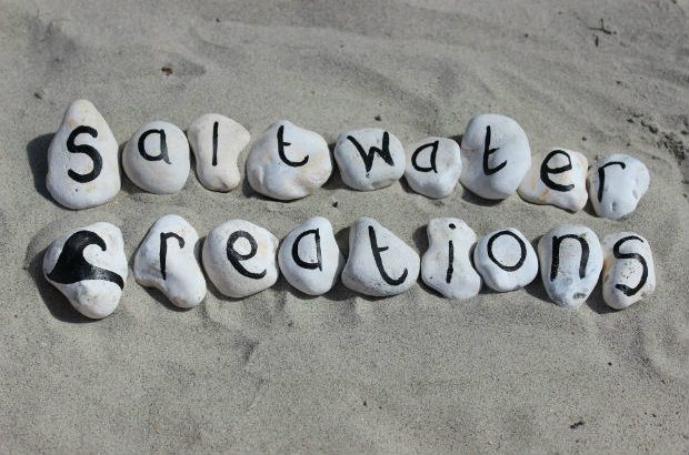 Pebbles spelling Saltwater Creations